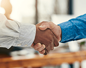 Page copy supporting image - shaking hands