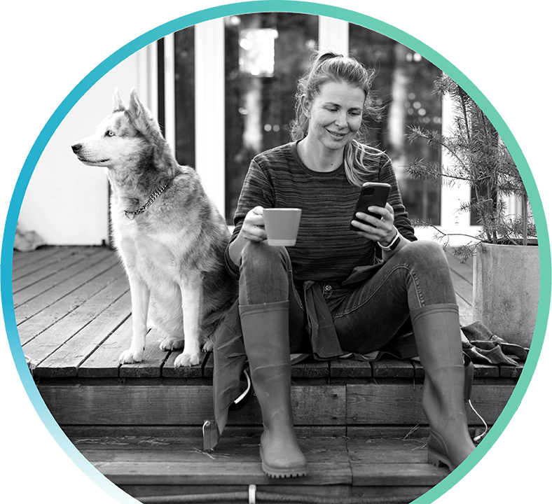 A woman sitting with her dog