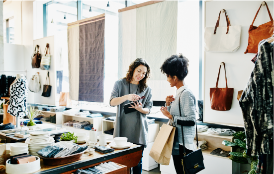 Woman Shopping using her First Tech Odyssey Rewards World Elite Mastercard