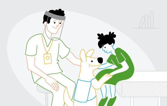 A doctor, a dog and a child in a medical office.