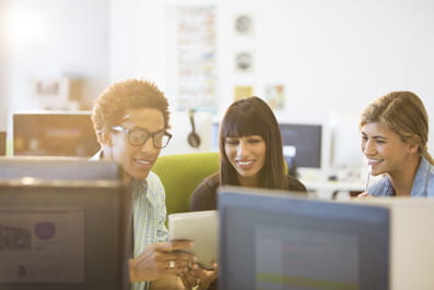 young people looking at a computer