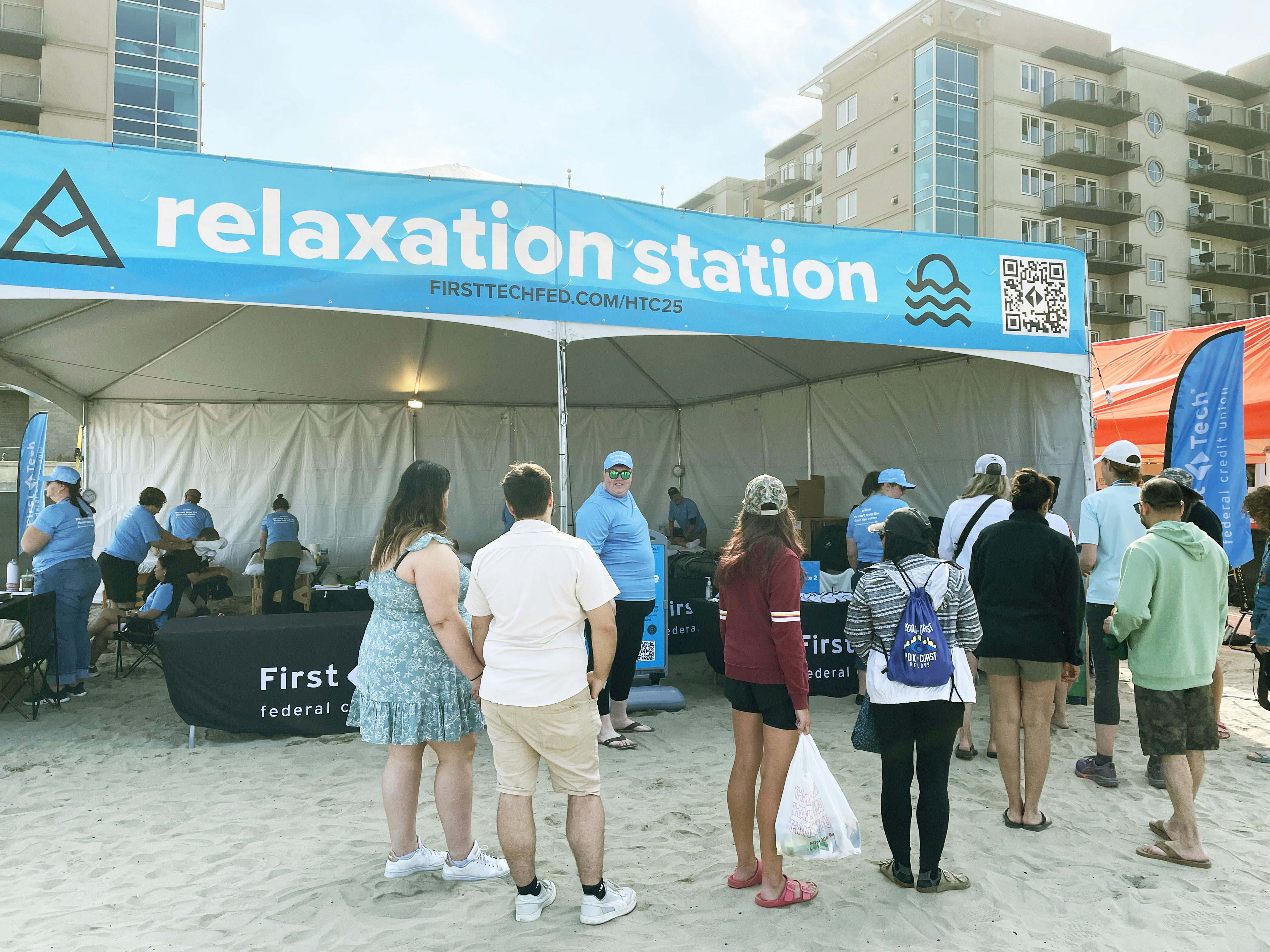 Crowd in front of First Tech's relaxation station at Hood to Coast race finish.