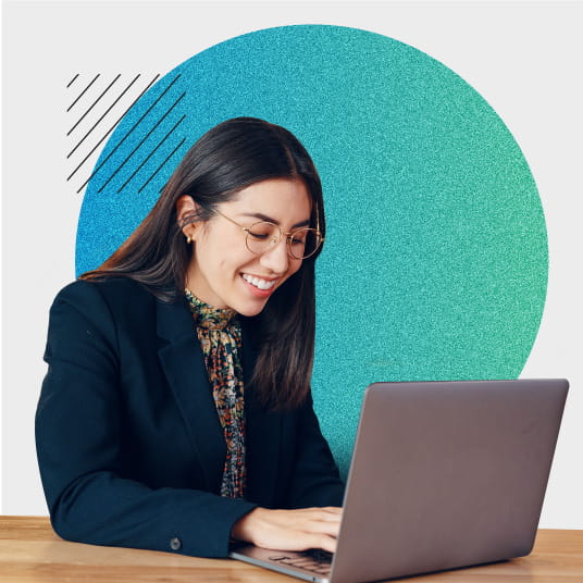 Woman typing on a laptop