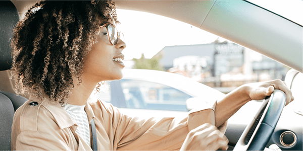 Woman driving a car.