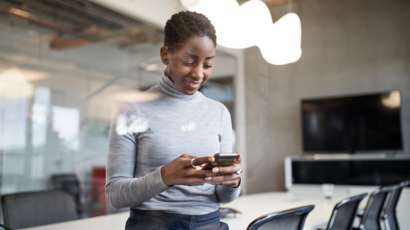 a lady looking at her phone