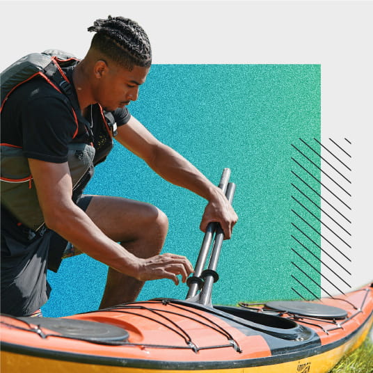 man loading kayak