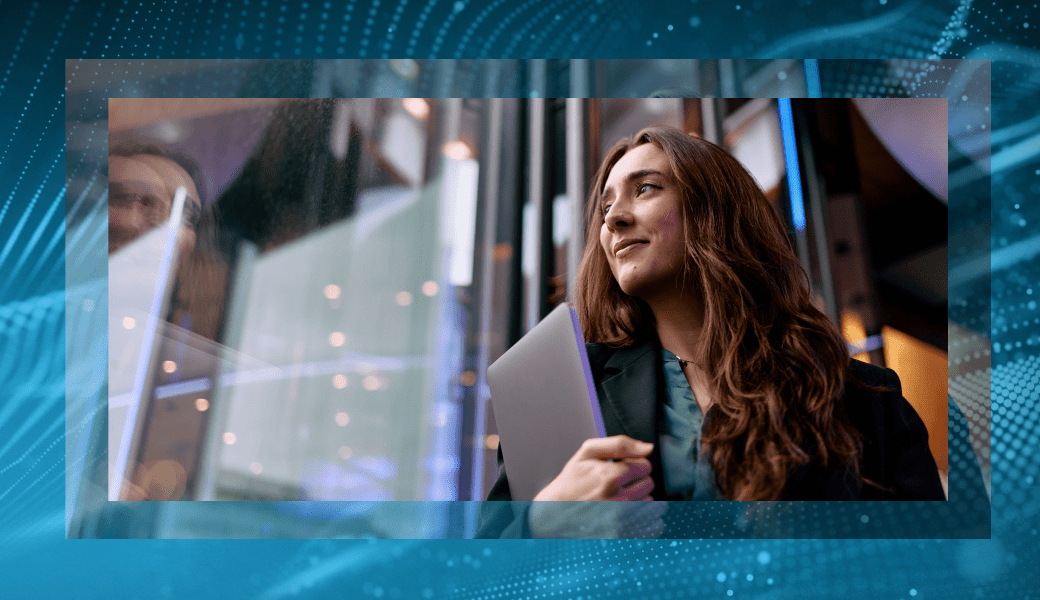 Woman holding a laptop with a stylized tech-focused background