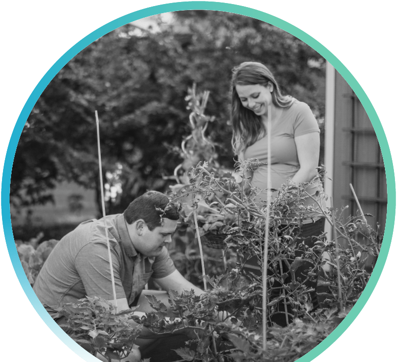 Two people outside gardening