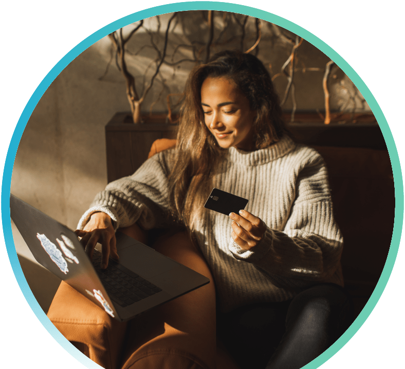 A woman holding a credit card