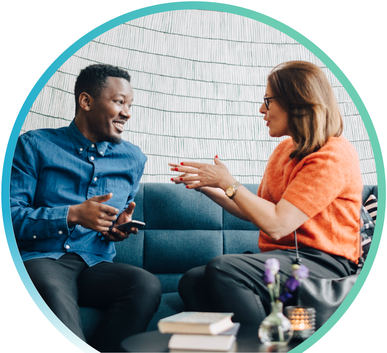 man and woman talking and smiling