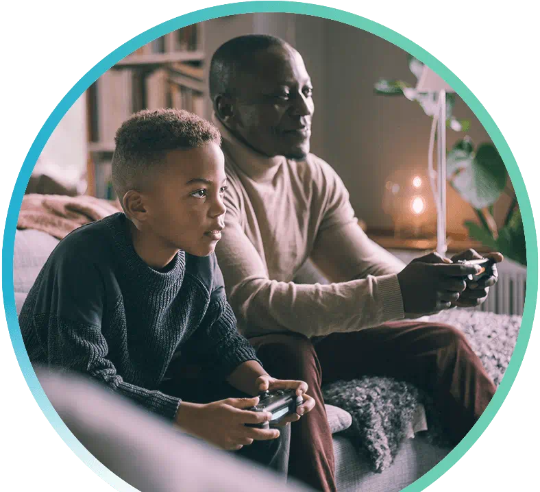 Father and son playing video games