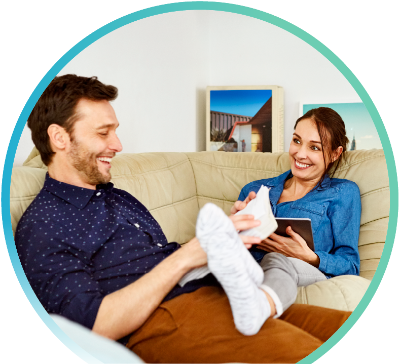 Smiling couple on a couch