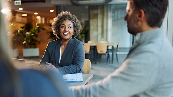 People talking at a table