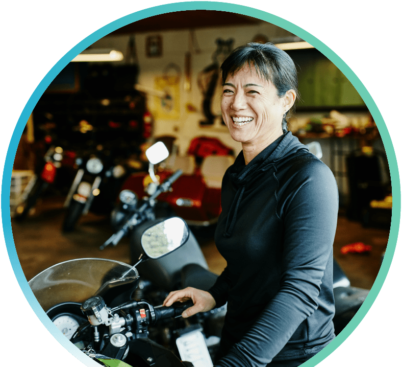 A woman on a motorcycle