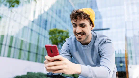 a boy checking his phone
