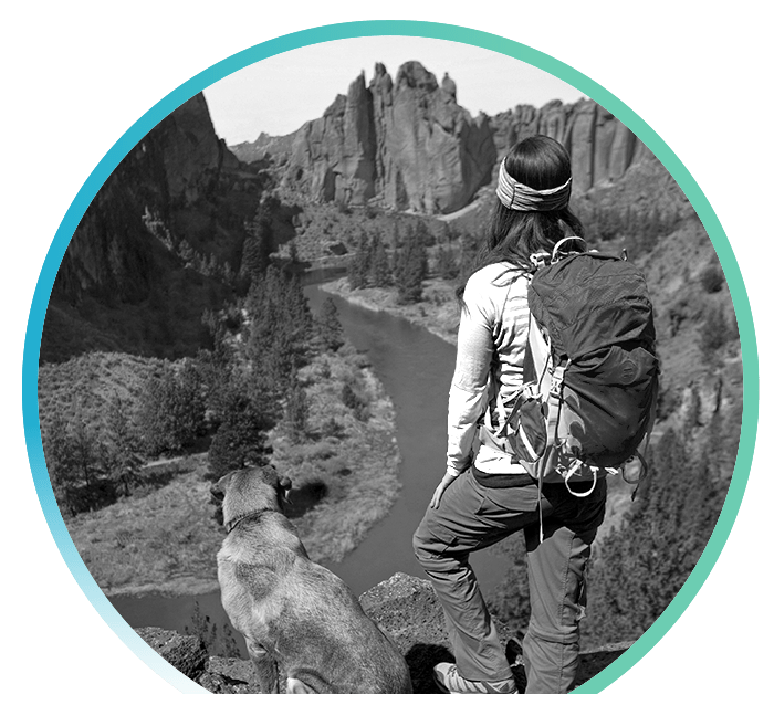 Woman with her dog on a walking trail