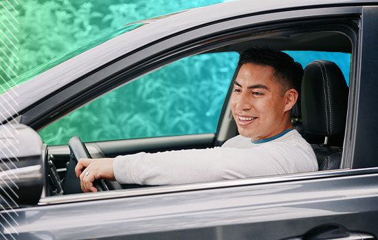 Man driving a car.
