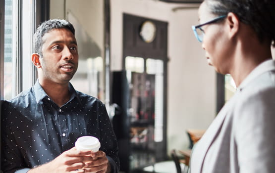Man talking with woman