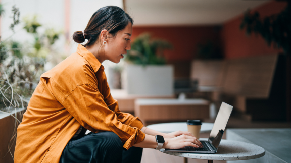 Girl typing on computer